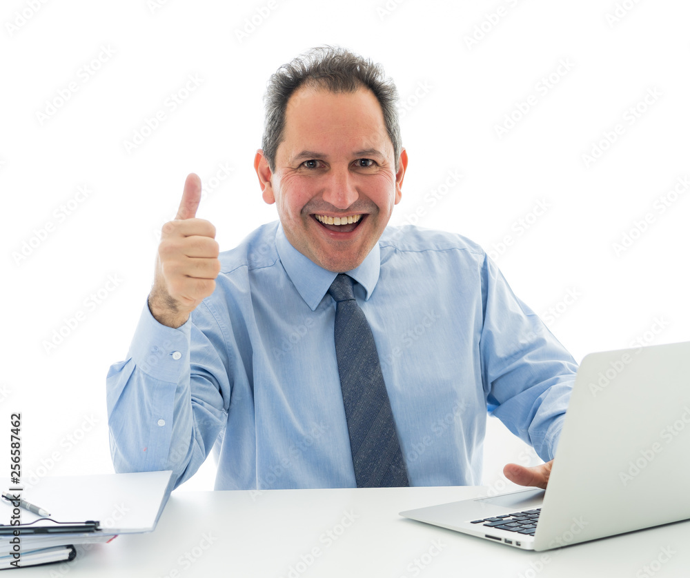 Mature caucasian businessman working on laptop computer at office in happy working and satisfaction Mature caucasian businessman working on laptop computer at office in happy working and satisfaction