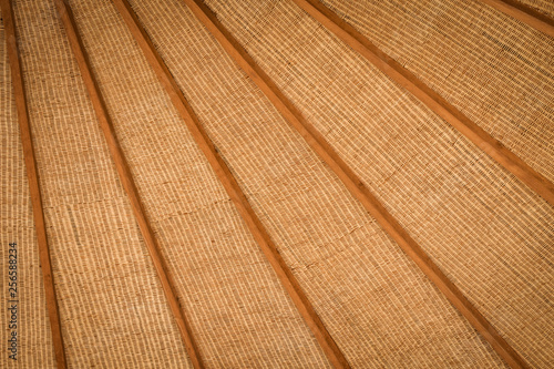 Timber framed woven bamboo ceiling for background. 