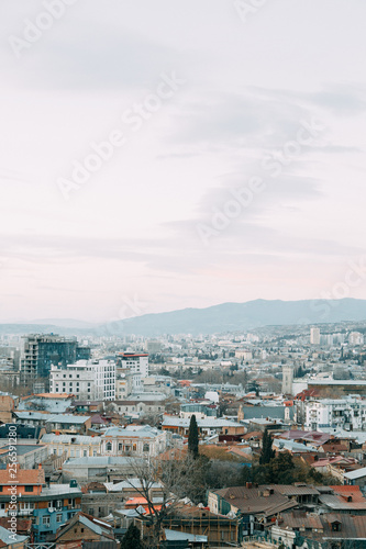Sunset and evening city Tbilisi  Georgia. Panoramic views and lights of historic neighborhoods.