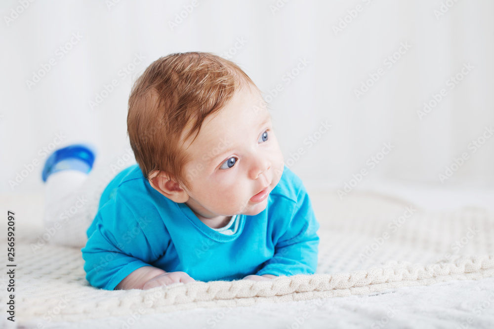 baby 2 months on bed baby 2 months on bed