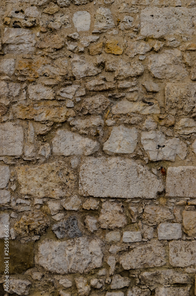 Abstract background - old sandstone wall.