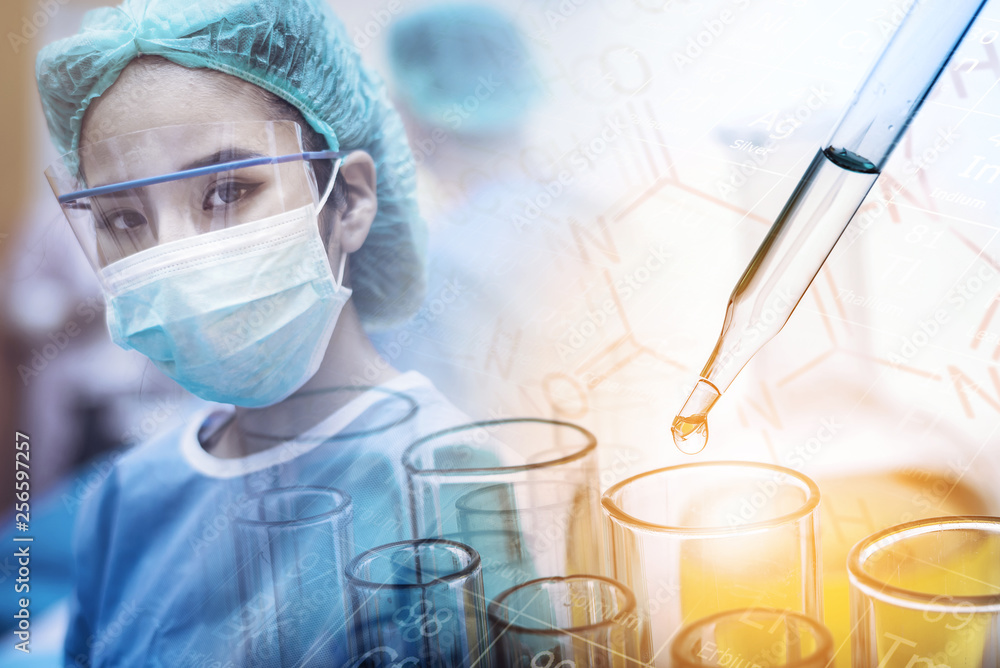 Scientist working in the operating room with dropping chemical liquid to test tube, medical research and development concept 