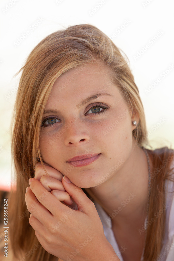 Portrait of a young woman looking at camera Portrait of a young woman looking at camera
