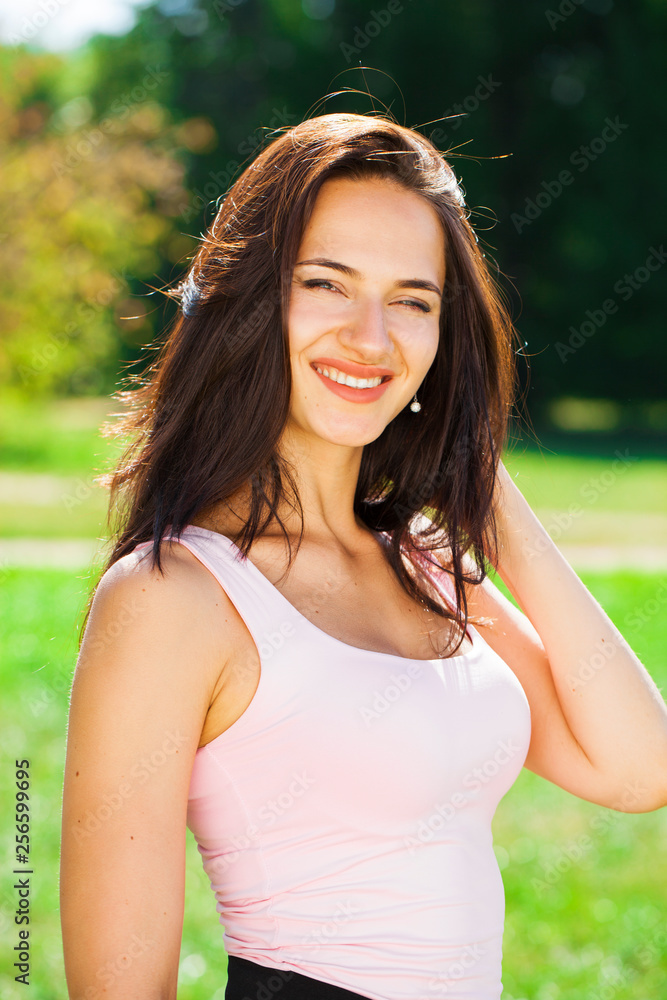 Beautiful brunette woman in sexy pink dress Beautiful brunette woman in sexy pink dress