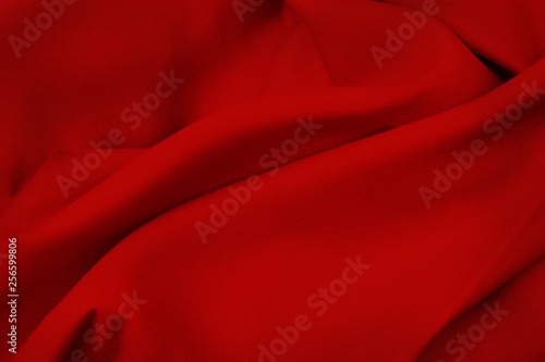 Dark red fabric texture for background and design art work, beautiful pattern of silk or linen.