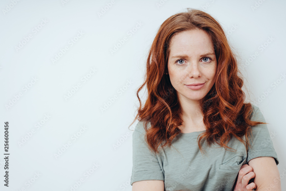 Sincere young woman with a quiet friendly smile Sincere young woman with a quiet friendly smile