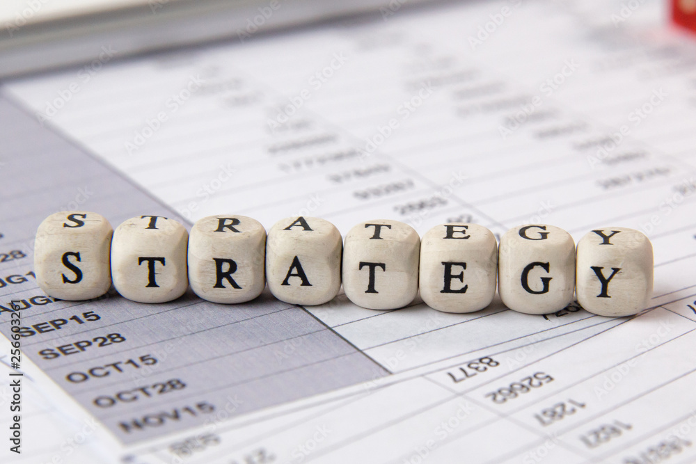 The strategy word on wood cube business content image. The strategy word on wood cube business content image.
