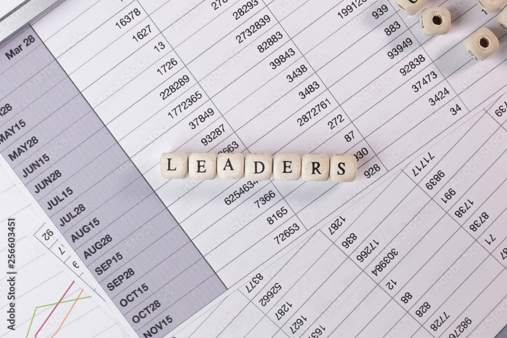 The leaders word on wood cube business content image. The leaders word on wood cube business content image.