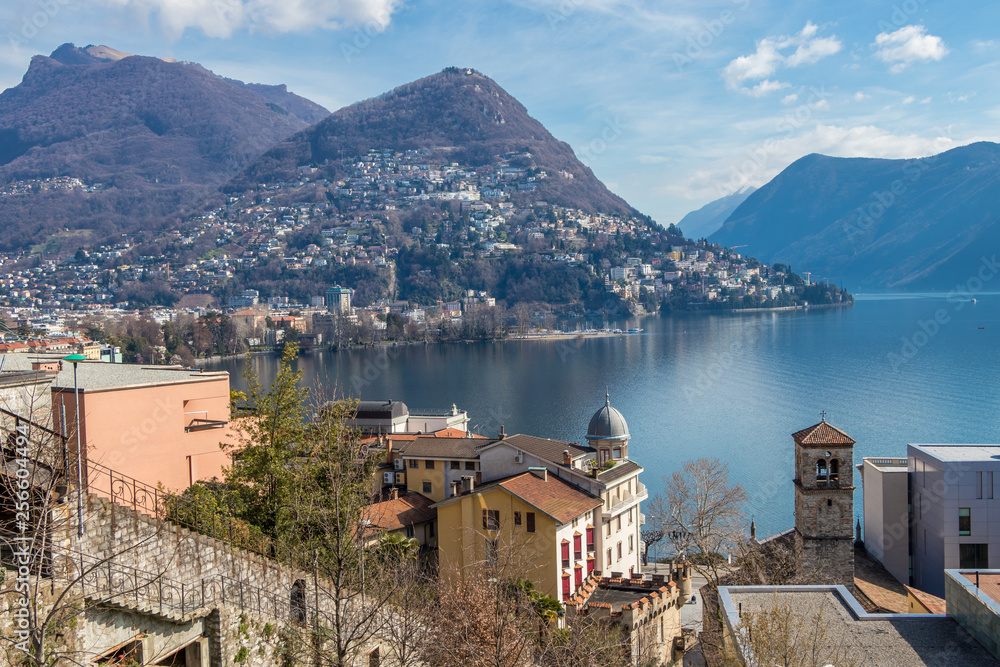 A view at the Lake Lugano and Alps mountains in Ticino canton of Switzerland