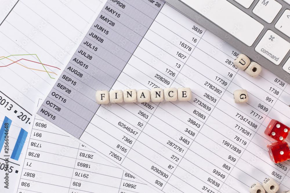 The finance word on wood cube business content image. The finance word on wood cube business content image.
