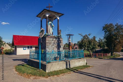 Small roaside Roman Catholic shrine with Our Lady statue in Przytarnia village, Poland photo