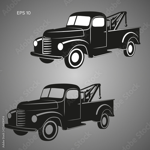 Old vintage tow truck vector illustration. Retro service vehicle.