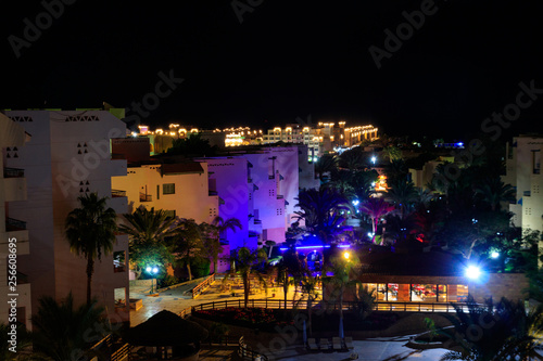 Night view of the modern tropical resort in Hurghada, Egypt. View from above © olyasolodenko