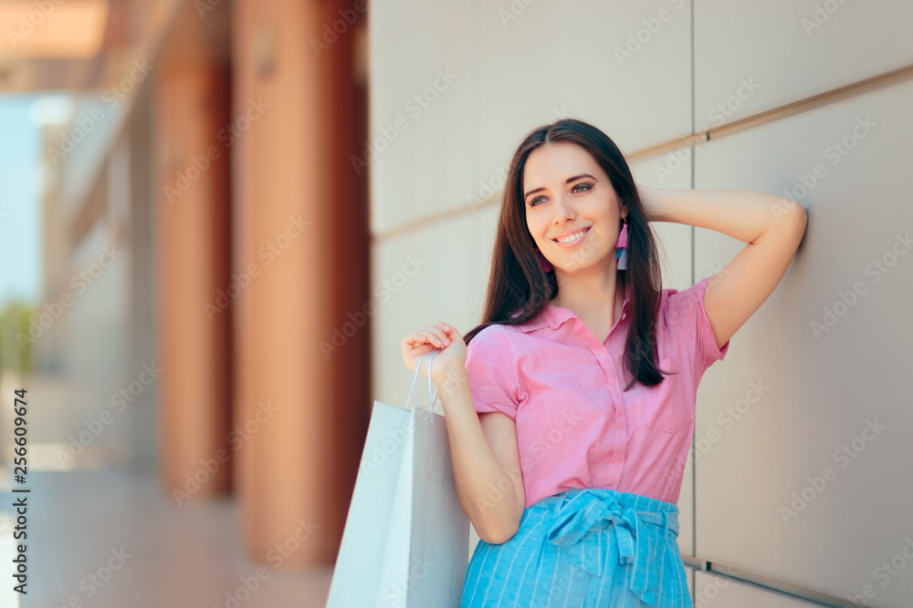 Female Shopper Standing in Front of the Mall 