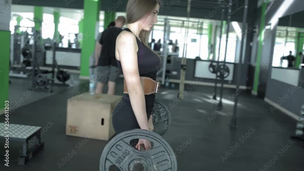 Sports girl in the gym Sports girl in the gym