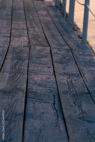 wooden road into the distance. old wood bridge pier with nobody. backgroud