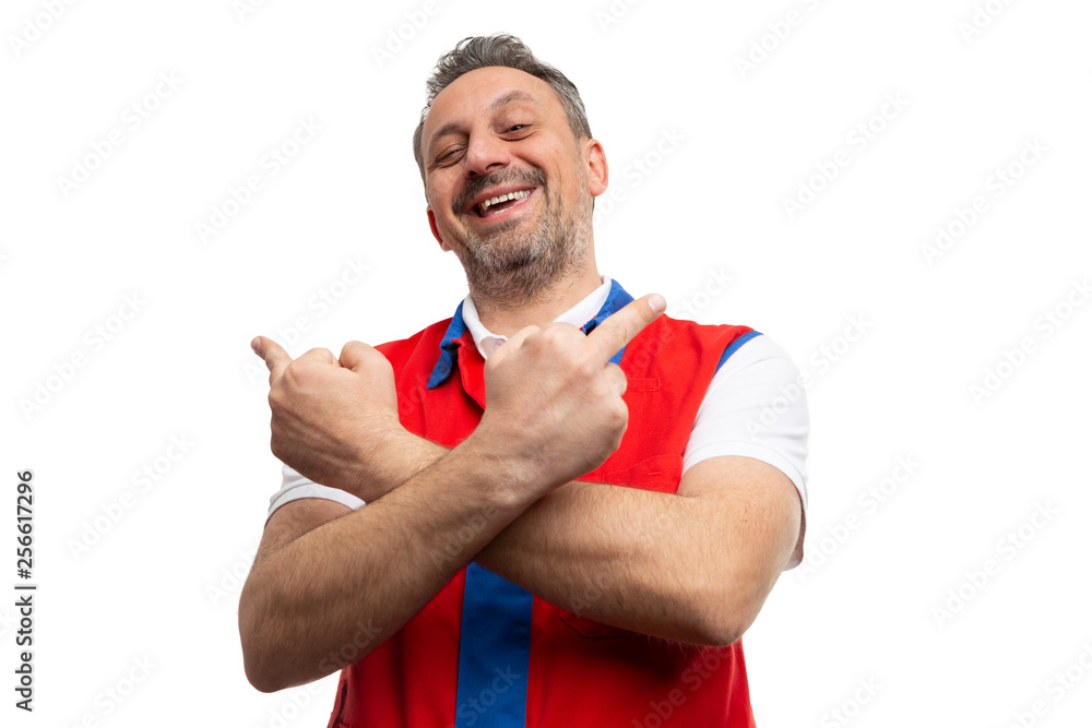 Man working at supermarket showing joking middle finger gesture. Man working at supermarket showing joking middle finger gesture.