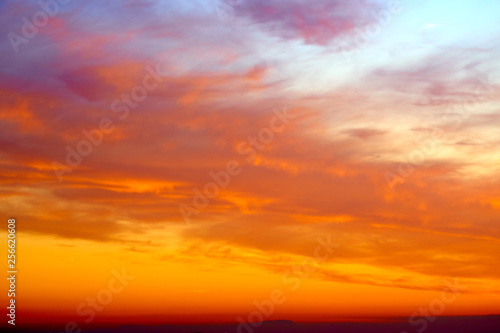 Colorful and dramatic sunset. Vivid abstract natural background.