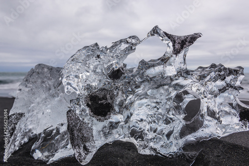 Ice on famous Diamond Beach next to Jokulsarlon glacier lagoon in Iceland