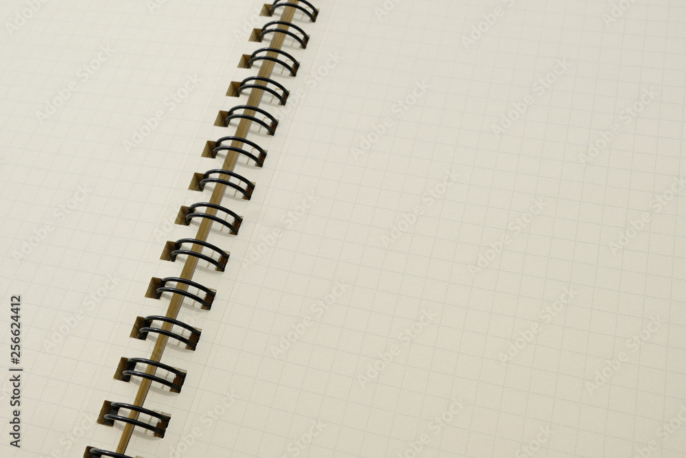 Closeup of coil binding notebook with empty blank page Closeup of coil binding notebook with empty blank page