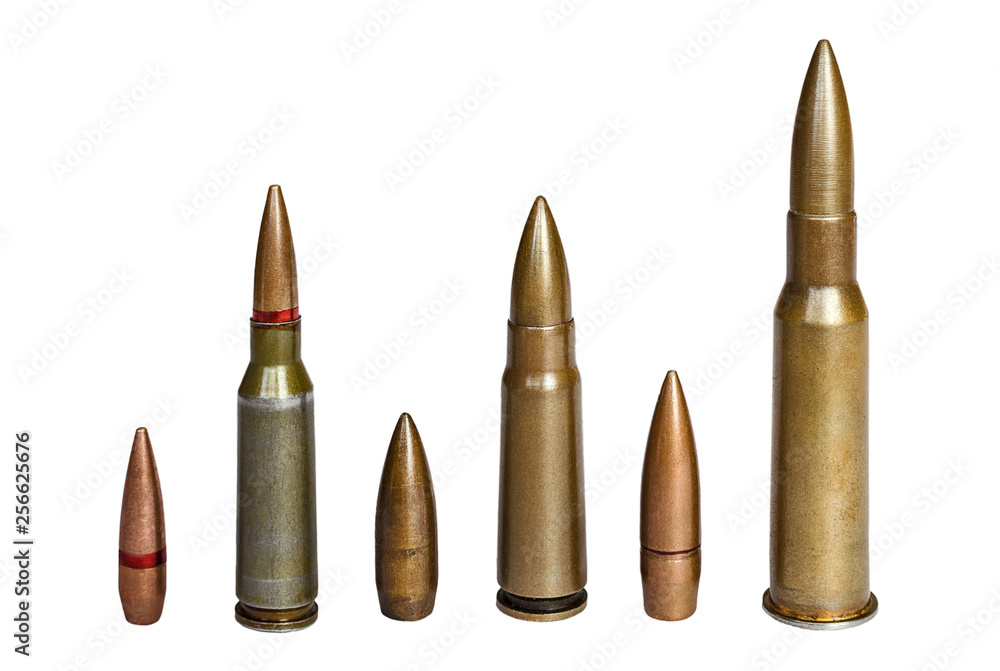 Cartridges and bullet of assault rifle and machine-gun of 7.62 caliber on white surface. Concept of weapon and military equipment. Cartridges and bullet of assault rifle and machine-gun of 7.62 caliber on white surface. Concept of weapon and military equipment.