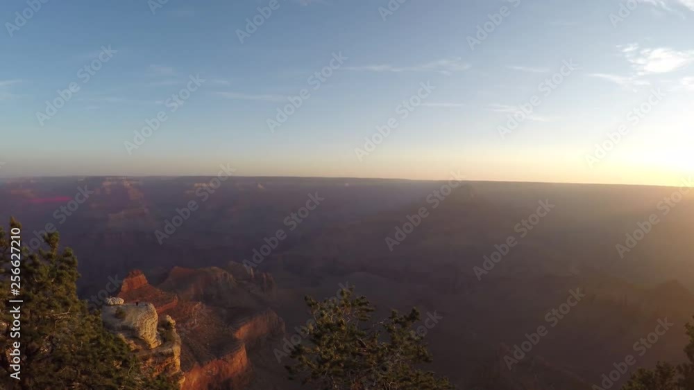Timelapse view on Grand Canyon with person walking around the edge Timelapse view on Grand Canyon with person walking around the edge