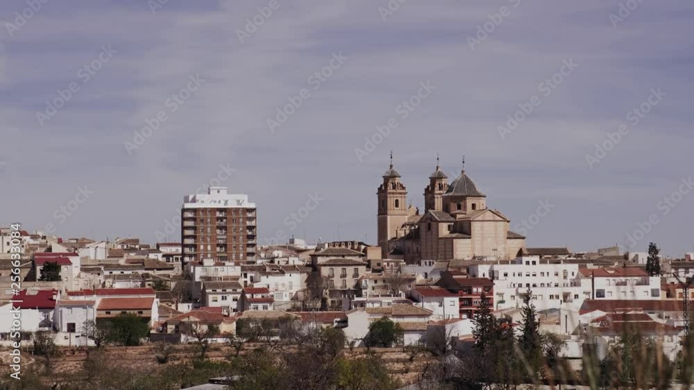 Small traditional village and church in Spain. Typical medieval view and modern style Small traditional village and church in Spain. Typical medieval view and modern style