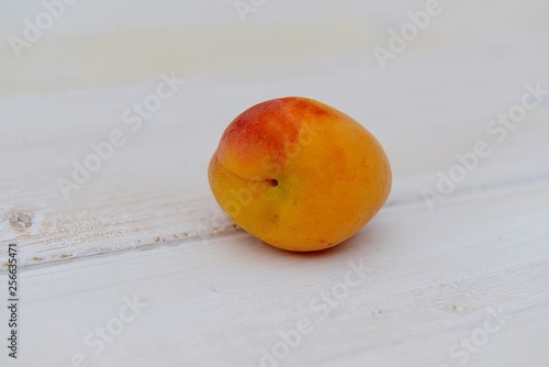 apricot on wooden table