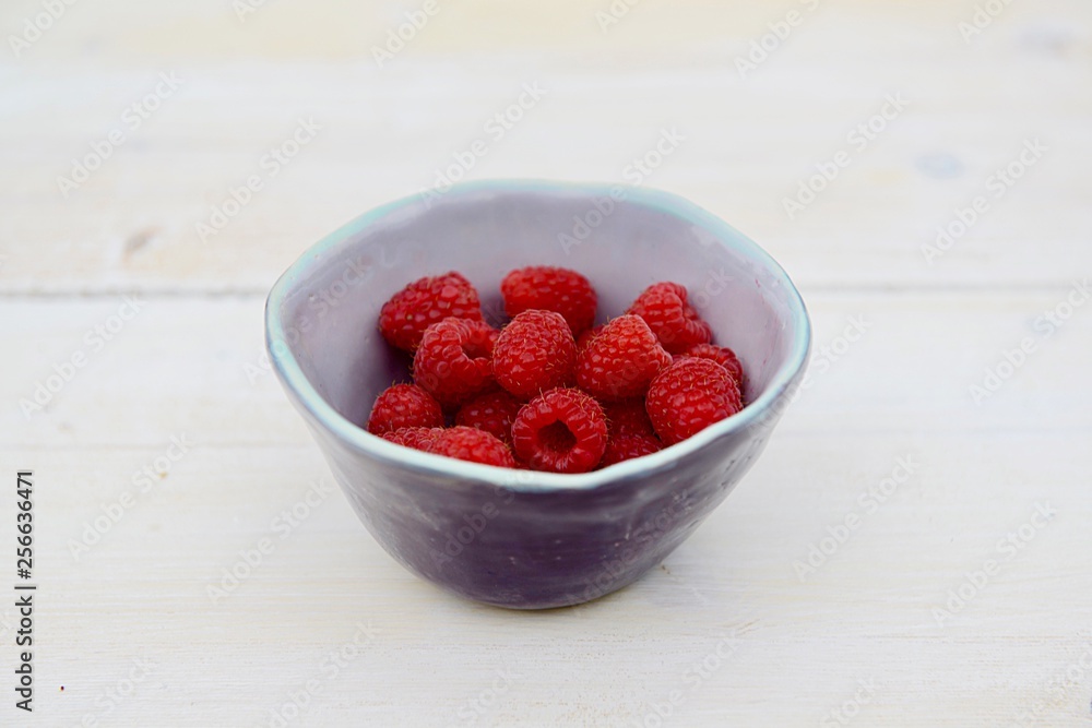 raspberries in bowl raspberries in bowl