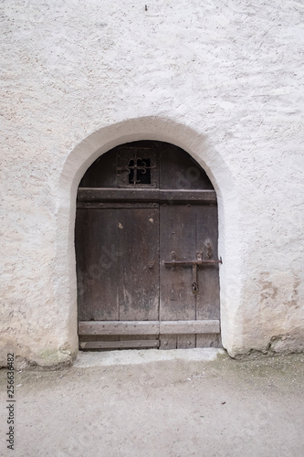 Little wooden door, ancient old European style © tarapatta