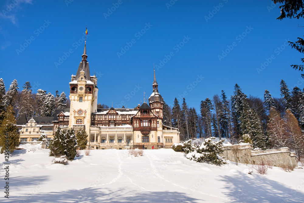 Peles castle in Romania. Beautiful, royal castle in snowy, white winter. 