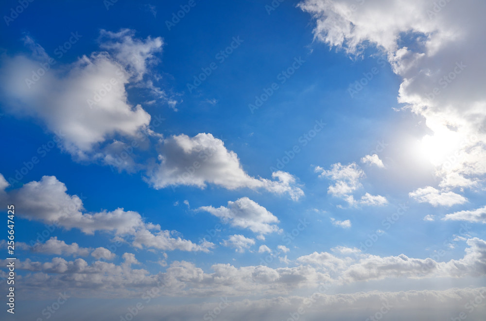 Obraz premium Blue summer sky with white clouds