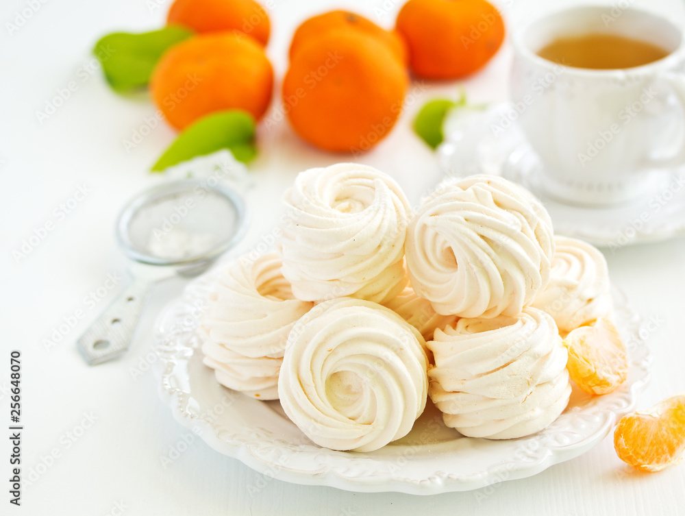 Delicious homemade marshmallows and oranges with spices. Delicious homemade marshmallows and oranges with spices.