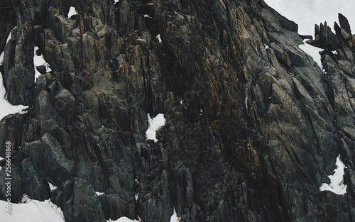 cliffs and rocks of snow peaks in Chamonix  photo