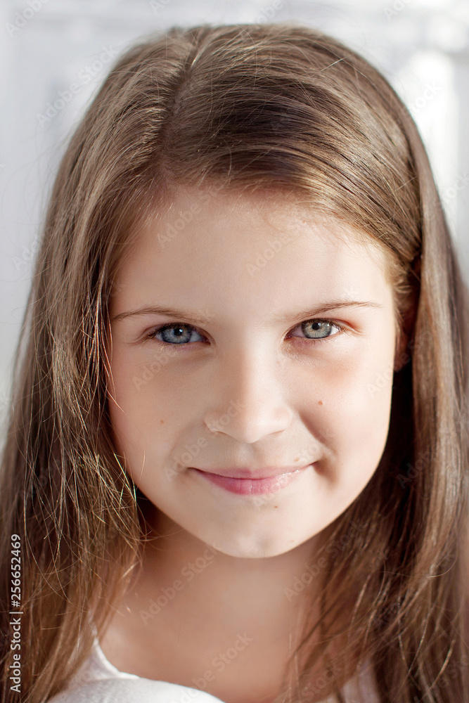 Portrait of pretty little emotion girl. Clouse up picture of beautiful smiling girl Portrait of pretty little emotion girl. Clouse up picture of beautiful smiling girl