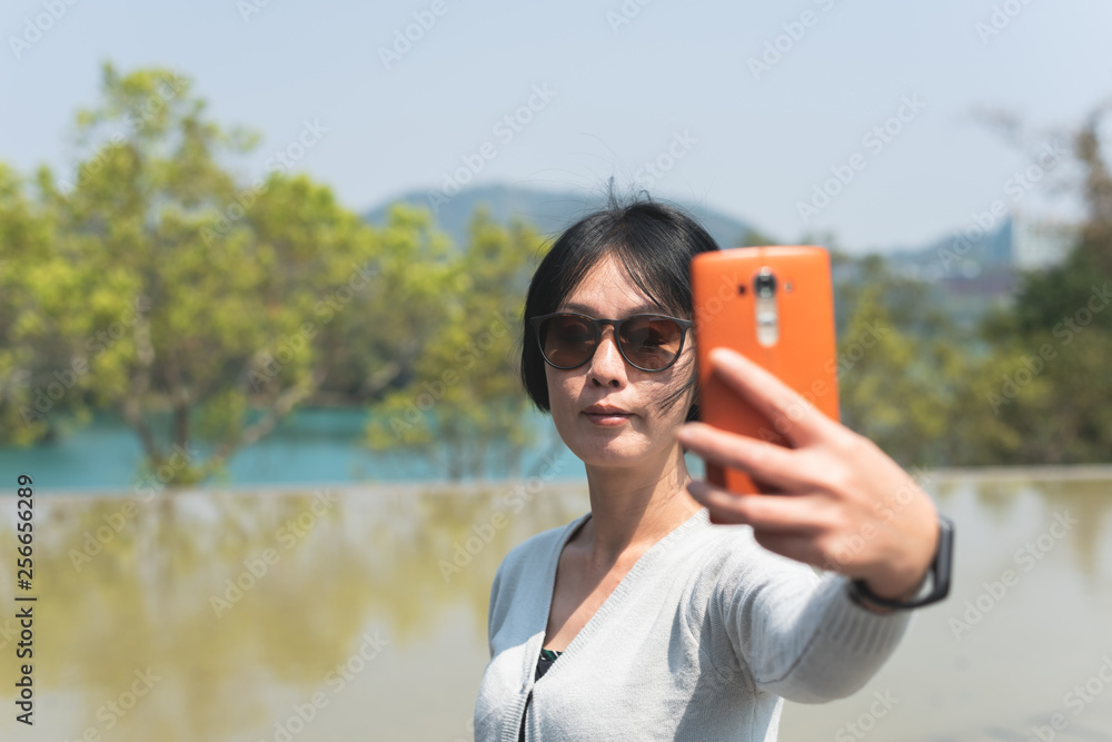 traveling woman selfie at Xiangshan Visitor Center