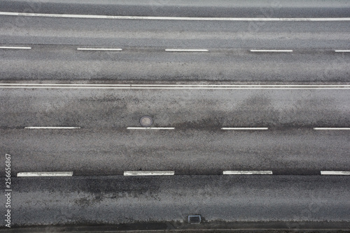 road with asphalt pavement and markings, top view