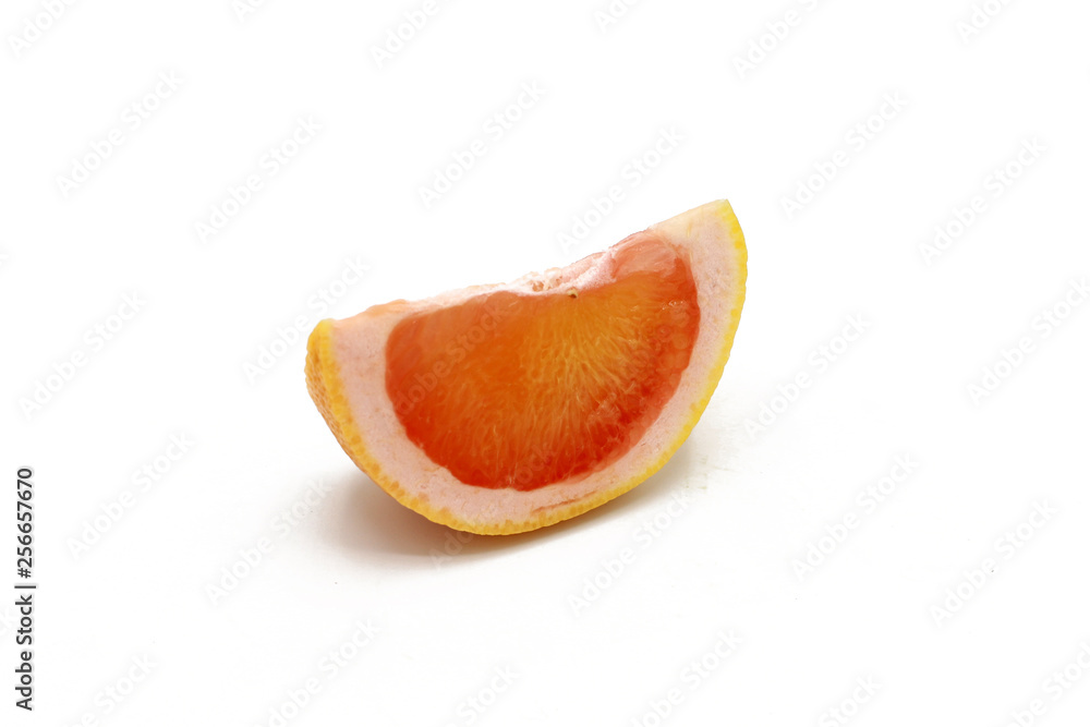 fresh sliced grapefruit pices - isolated on white fresh sliced grapefruit pices - isolated on white