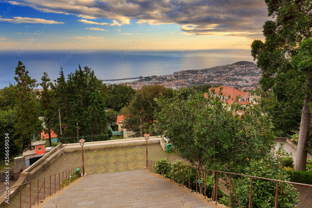 Beautiful cityscape of the city Funchal on the island Madeira, seen from the Monte Funchal at sunset in summer