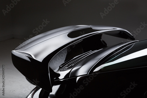 Close up of rear sports car spoiler photo