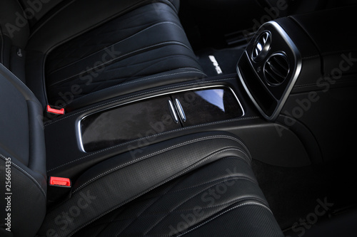 Storage compartment in luxury car interior © camerarules