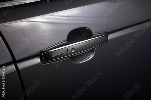 Close up of door handle on black car