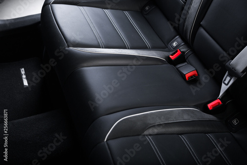 Close up of black leather passenger seats © camerarules