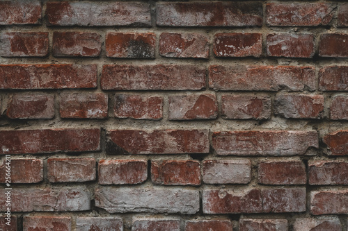Old vintage red brick wall. Red brick wall texture. Old red urban brick wall background.