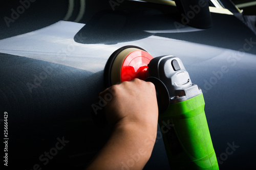 Close up of rotary machine detailing car panel