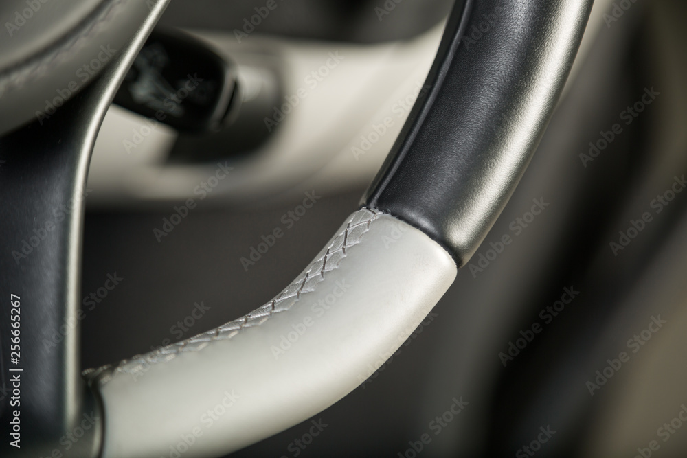 Detail shot of car steering wheel
