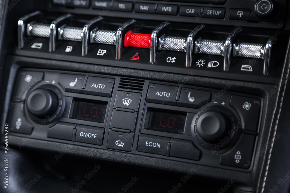 Close up of temperature control panel in sports car interior