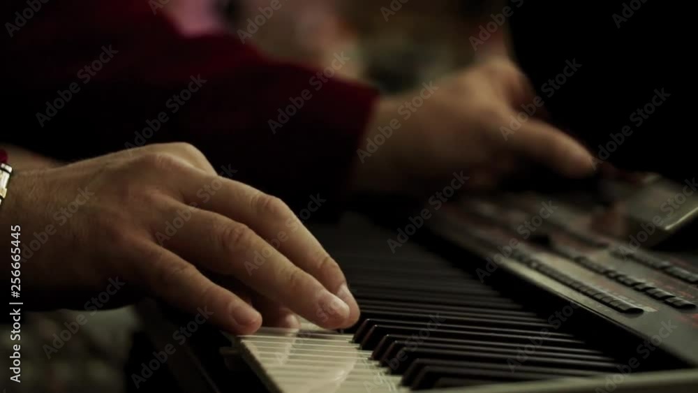 Hands on the organ close up Hands on the organ close up