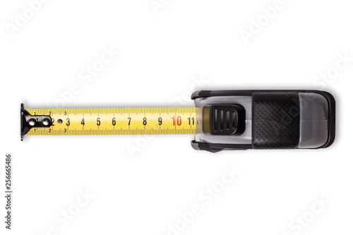Metal measuring tape isolated on white. Construction site tool.
