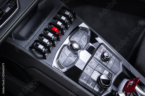 Control panel with buttons in sports car interior